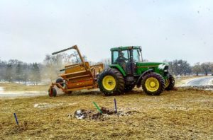 Mulching with rolled straw bales